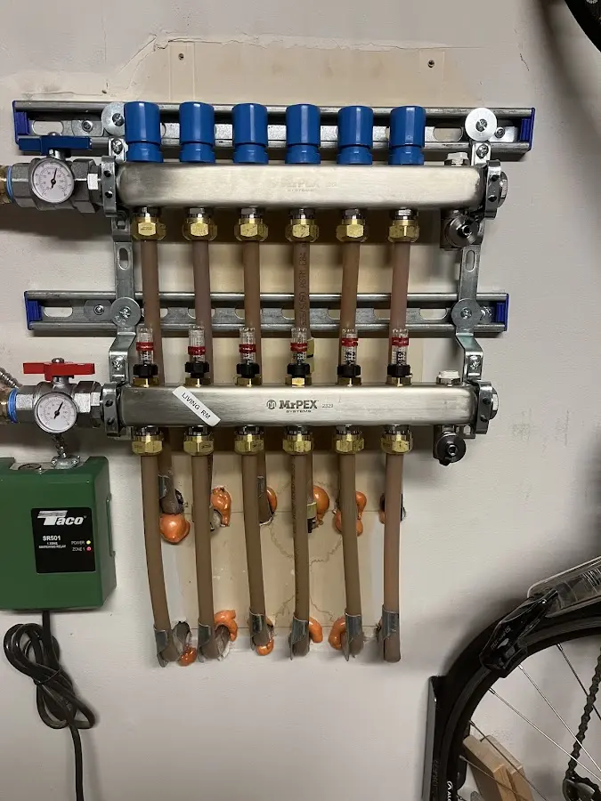 Plumber performing Leak Detection at a residential property in Mayfair